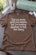 Money Doesn't Buy Happiness But Donations Might T-Shirt
