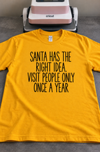 Santa's Got It Right. Visit People Once A Year T-Shirt